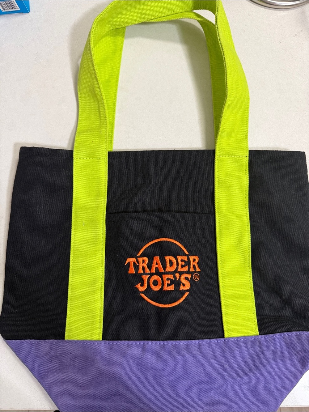 Trader Joe’s- Black Tote Bag with Lime Handles and Purple Base